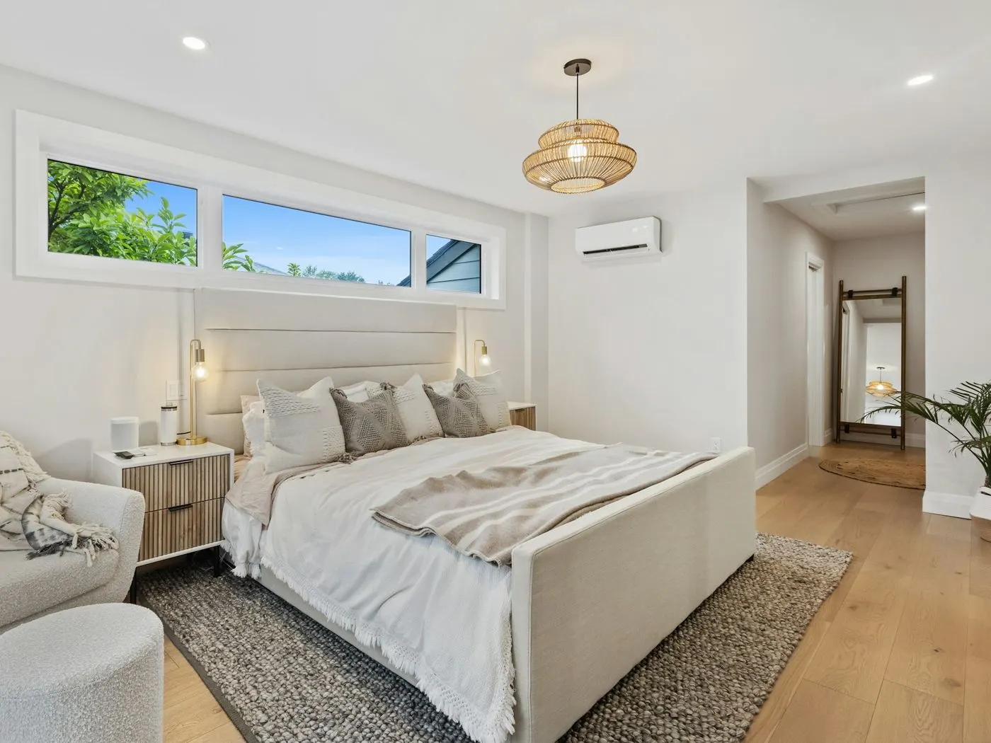 Guest bedroom with a freshly made bed, ready for check-in